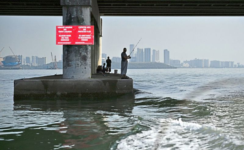 Three anglers detained for fishing beneath Penang bridge