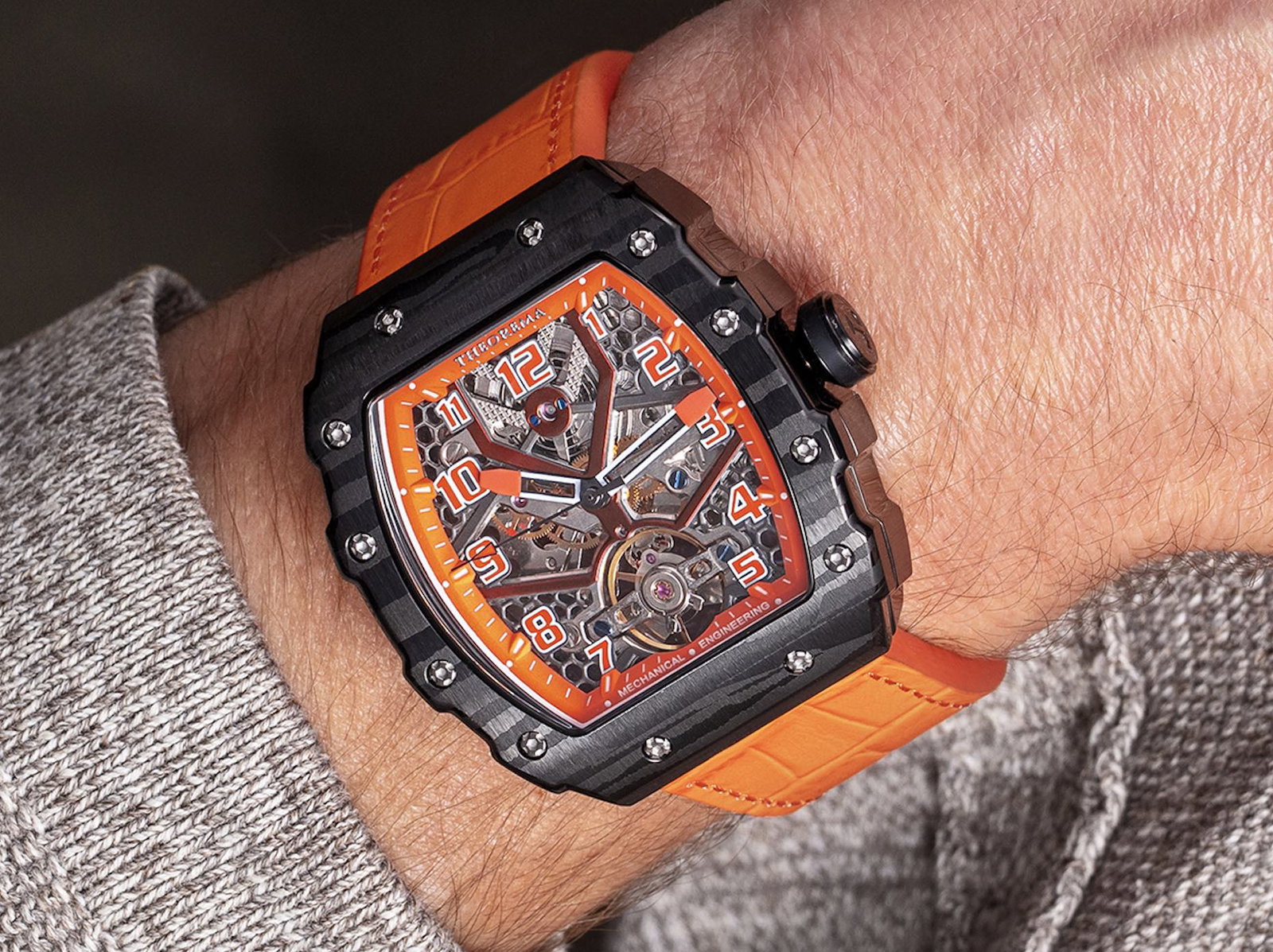 Orange color. Unique design with big Arabic numerals.