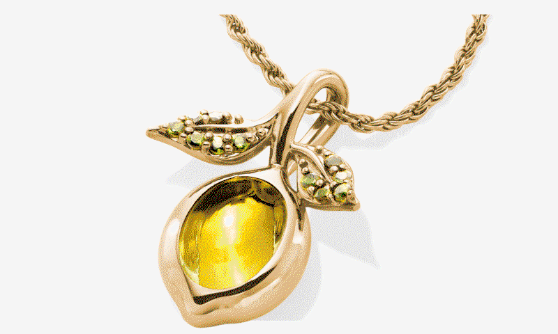 Yellow gold lemon pendant necklace. Round diamond halo engagement ring.Black stainless steel link bracelet.