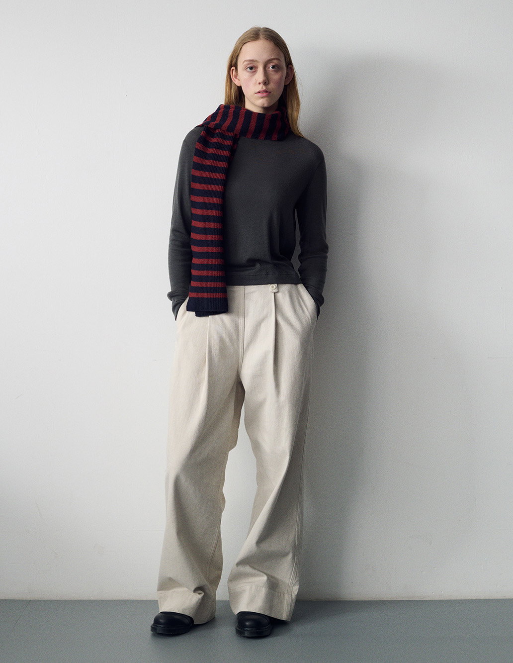 Striped scarf with wide leg trousers