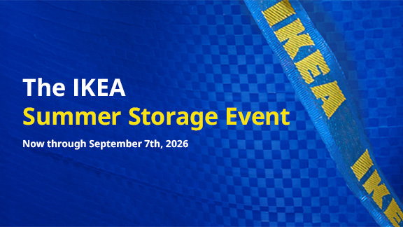 An IKEA employee helping a customer in store