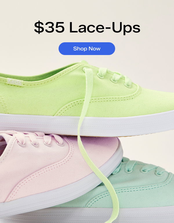A stack of three Keds Champion Canvas Lace-Ups in different colors (bay, icy pink, and light lime). Above the sneakers, text says $35 Lace-Ups. Shop Now.