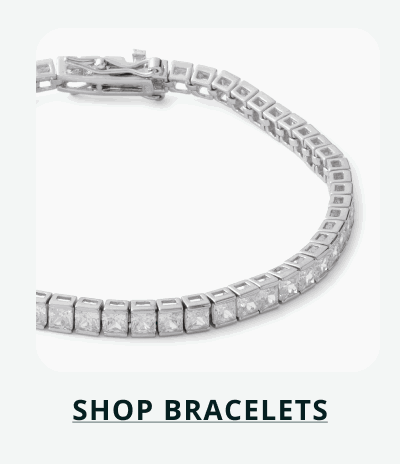 Silver-set tennis bracelet with square-shaped stones. Click here to shop bracelets