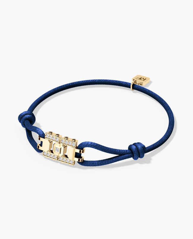 la-paz-cord-bracelet-with-gold-charm-0-20ct-diamonds