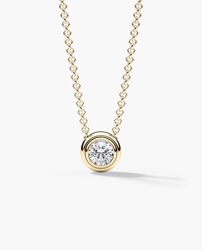 lode-solitaire-bezel-set-floating-round-cut-diamond-necklace