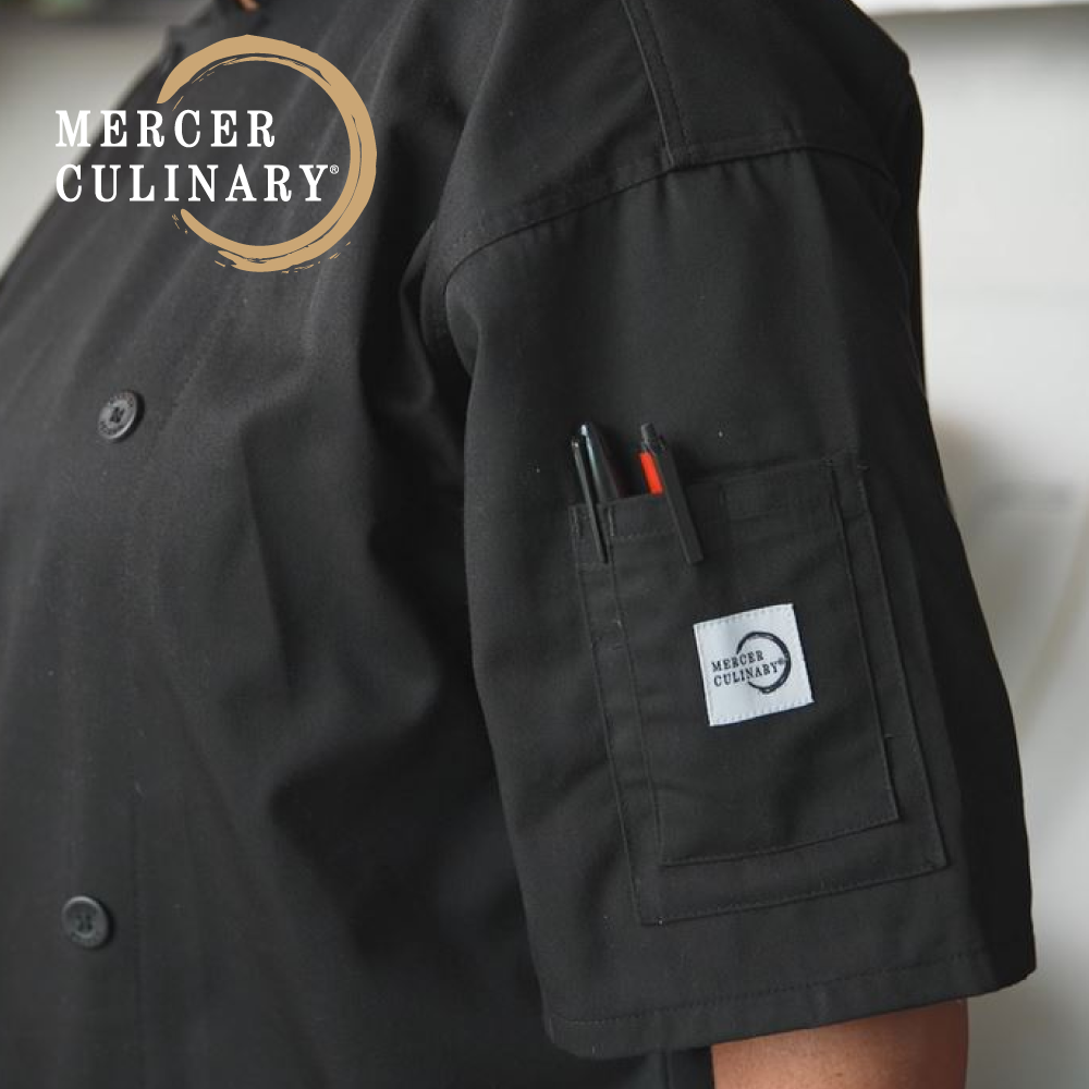 Mercer Culinary Millennia Air® chef coat featuring a short-sleeve design with a utility pocket holding pens on the sleeve.