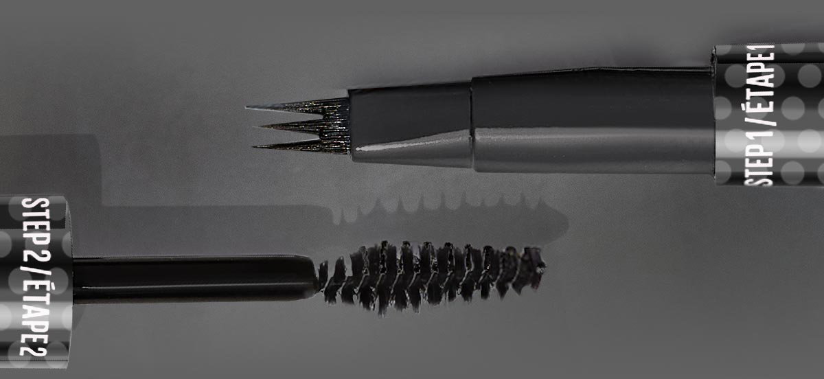 Close-up of the Brow Inserts Multiplying Tool’s dual-ended design, featuring a precision multi-prong brow pen tip on one end and a spoolie brush on the other.
