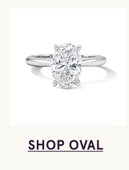 White-gold band with oval-cut centered stone. Click here to shop oval
