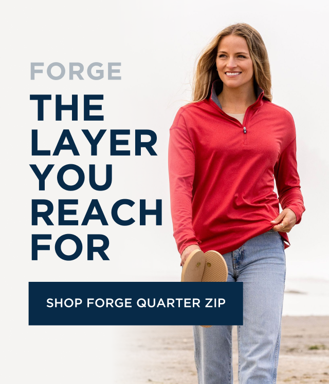 Woman wearing Forge Quarter Zip on the beach | Shop Forge Quarter Zip