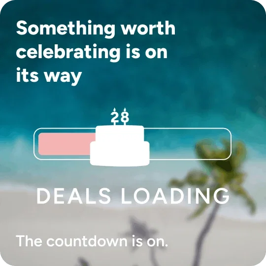View of a beach background with a birthday cake and text