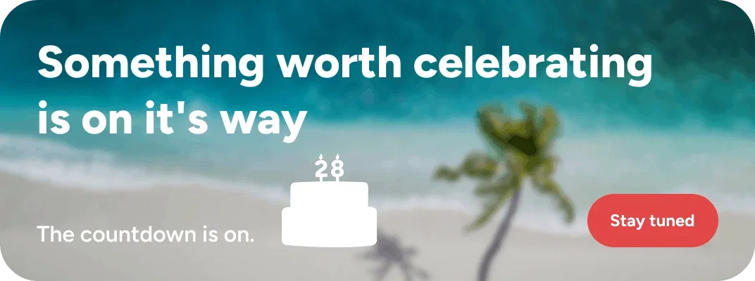 View of a beach background with a birthday cake and text