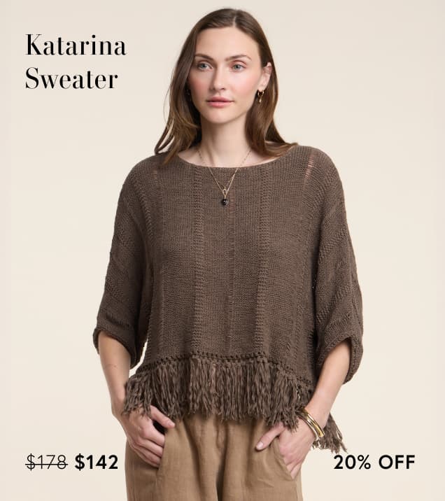 Image shows a model wearing the Katarina Sweater in Spruce.