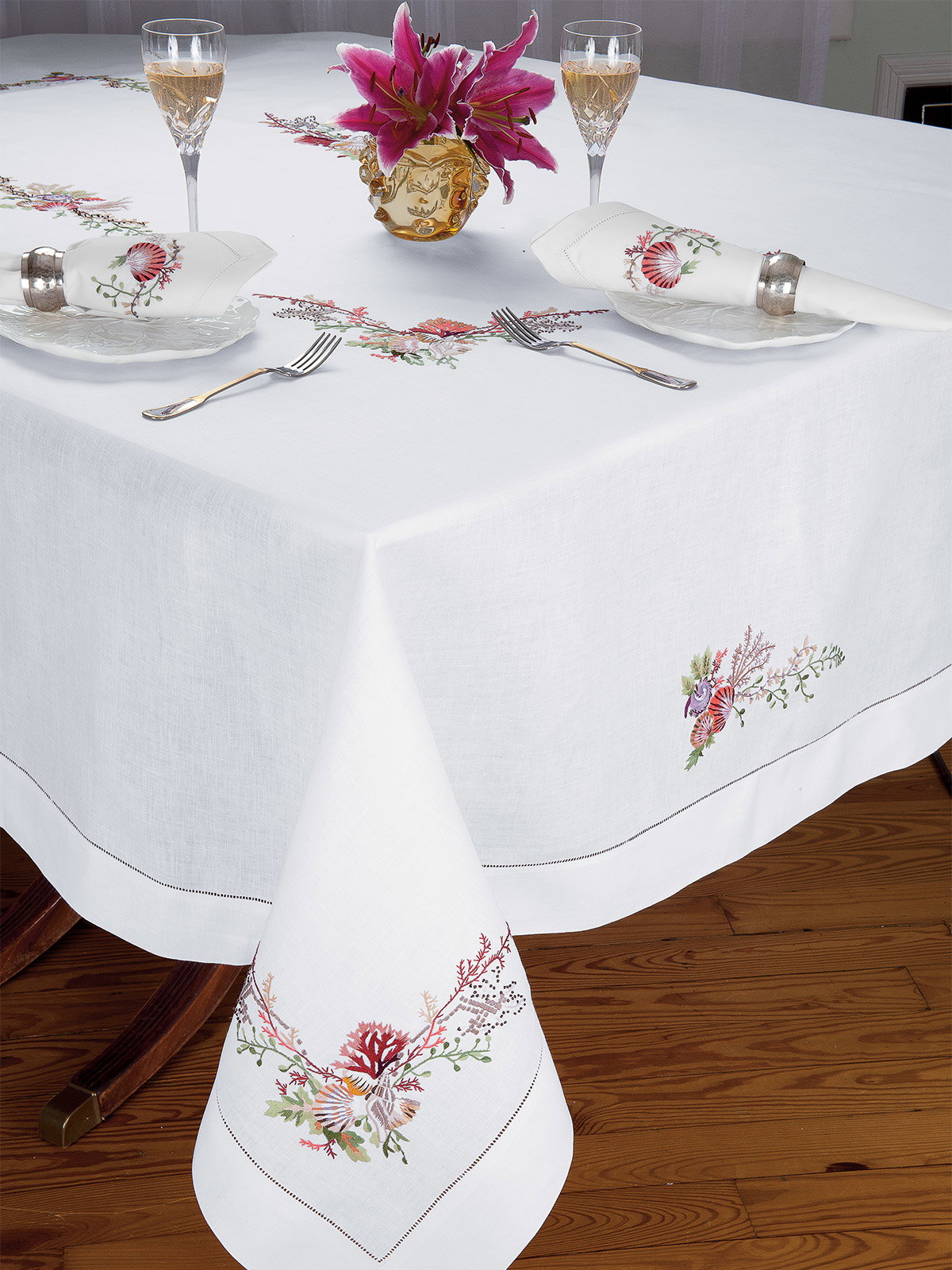 Palm Beach: Lovely seashells and beach flora are hand-embroidered on fine White Italian linen