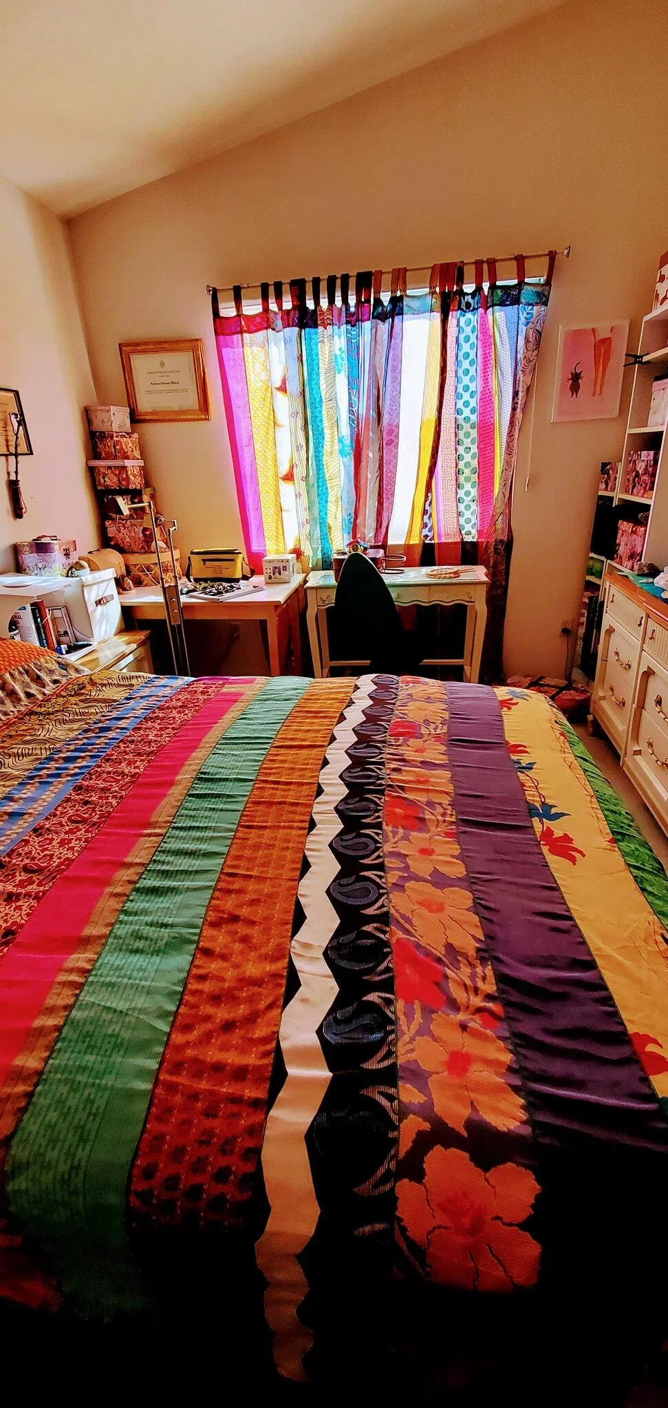 Rainbow Oasis Drapes - two short panels and two outdoor patio panels hung in a customer's home