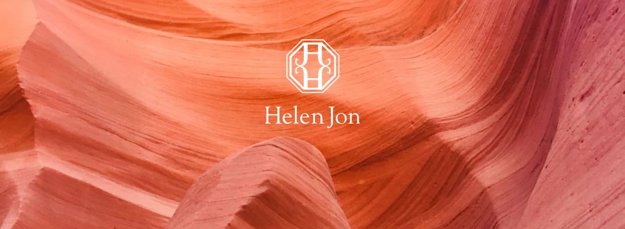 Helen Jon logo over canyon coral scene