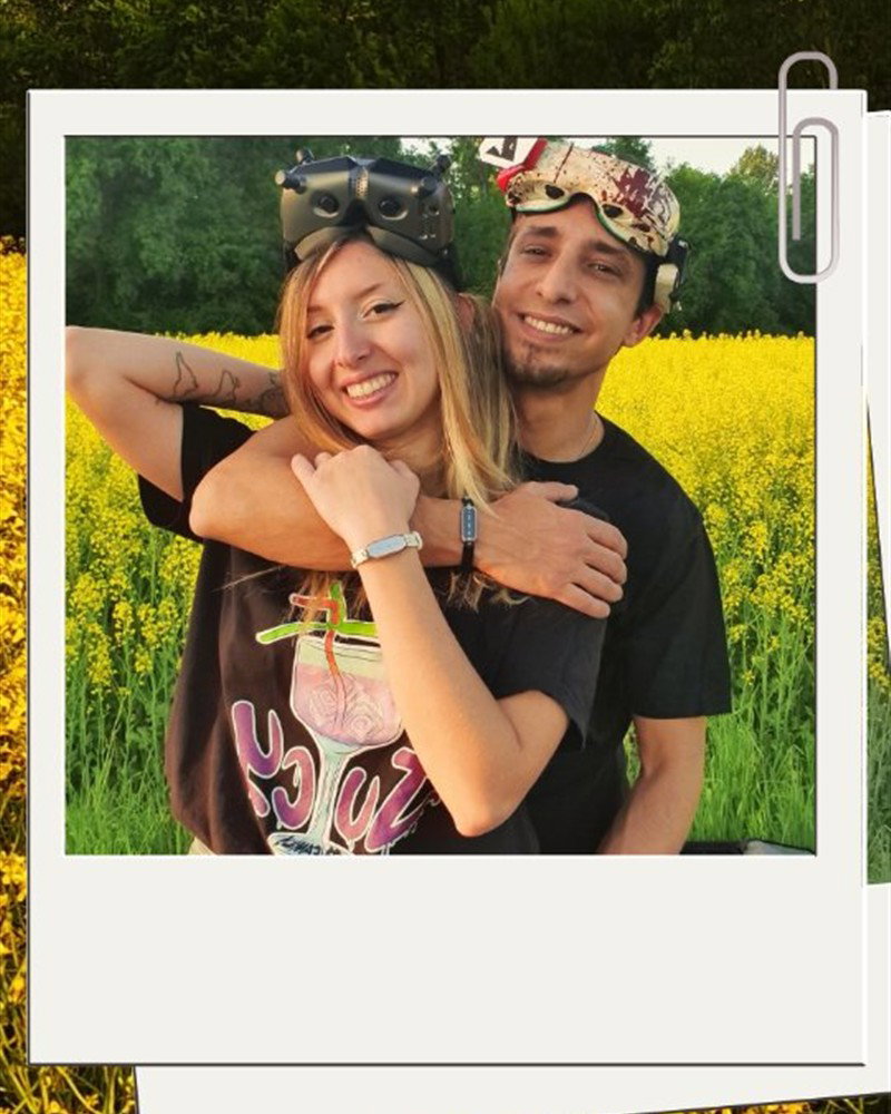 A couple wearing Morse Love touch bracelets outdoors