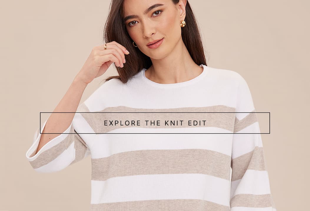 Model wearing a cream and taupe striped knit sweater with an Explore the Knit Edit button.