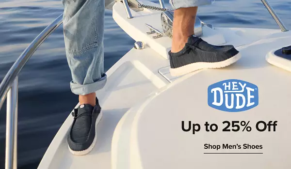 Image of a pair of HEY DUDE shoes. HEY DUDE logo. Shop Men's Shoes. 