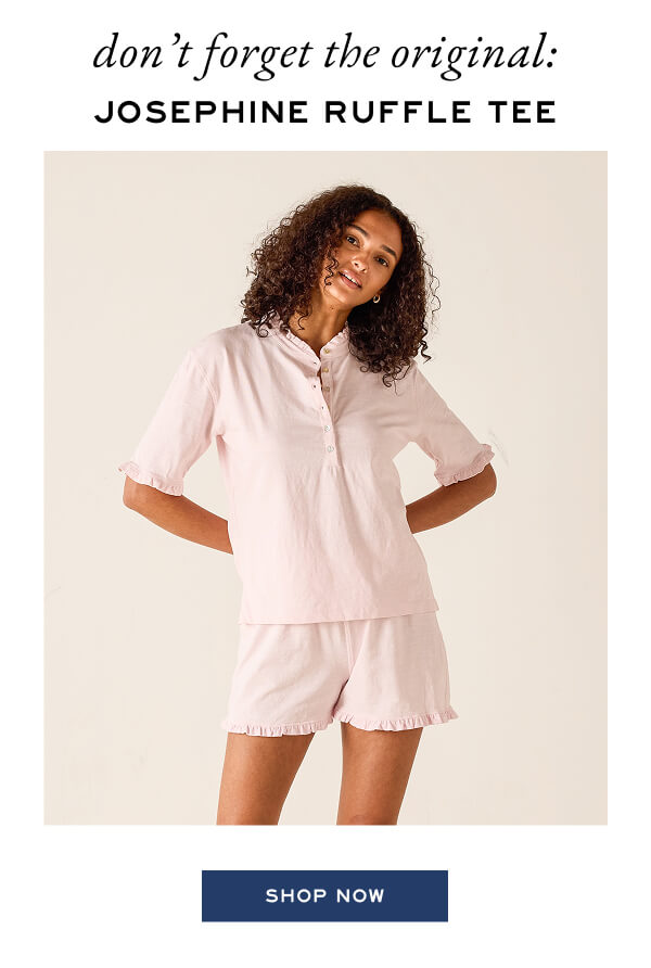 Don't forget the original: Josephine Ruffle Tee - Shop now - Image of a woman wearing a light pink short sleeve tee with ruffle details.