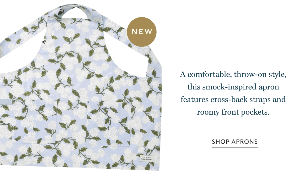NEW | A comfortable, throw-on style, this smock-inspired apron features cross-back straps and roomy front pockets. | SHOP APRONS