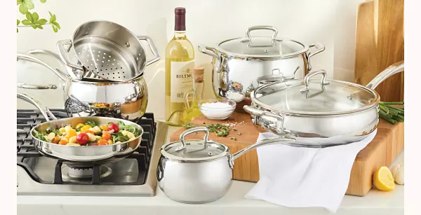 A matching set of stainless steel cookware.