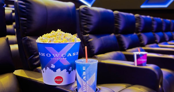 2 or 4 Showcase Movie Tickets with $10 Domino's Gift Card
