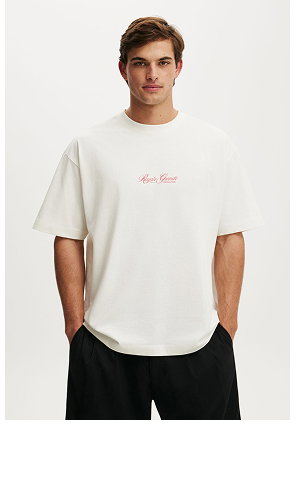 Man wearing cream t-shirt