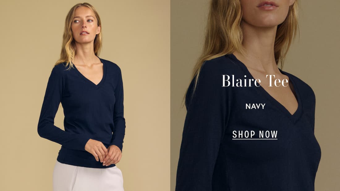 Image shows a model wearing the Blaire Top in Navy.