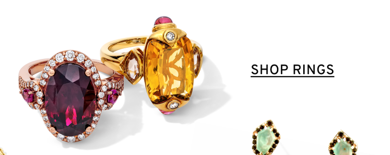 Two different gemstone cocktail rings. Click to Shop Rings