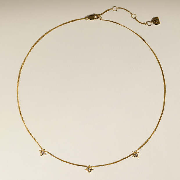 Cosmic Star Charm Necklace in Gold