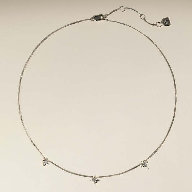 Cosmic Star Charm Necklace in Silver