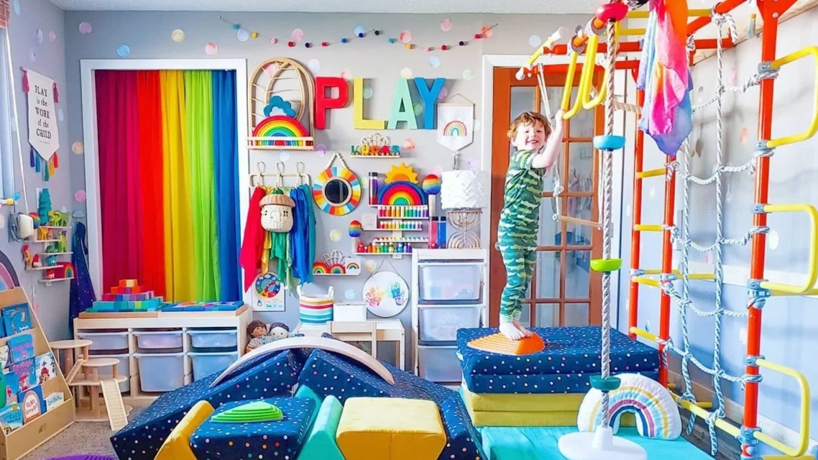 A child at home with a Brainrich indoor gym in his room