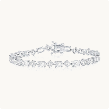 Cubic Zirconia Round and Oval Alternating Tennis Bracelet in Sterling Silver