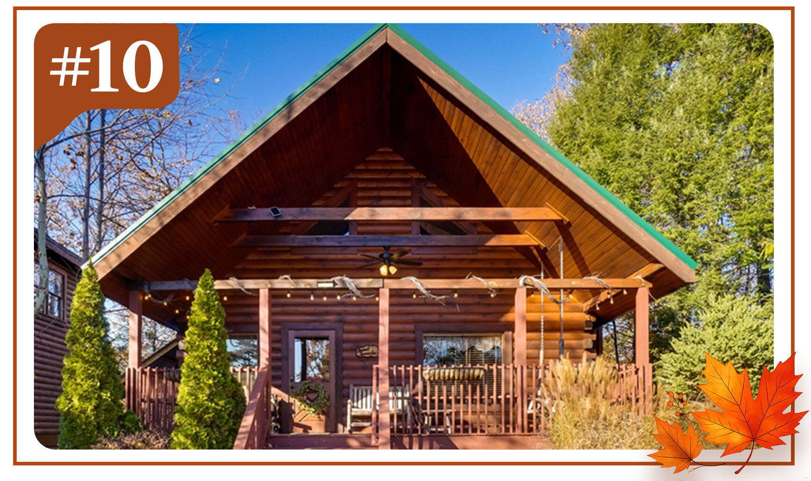 Classic log cabin with a welcoming porch, framed by tall evergreens beneath clear blue skies.