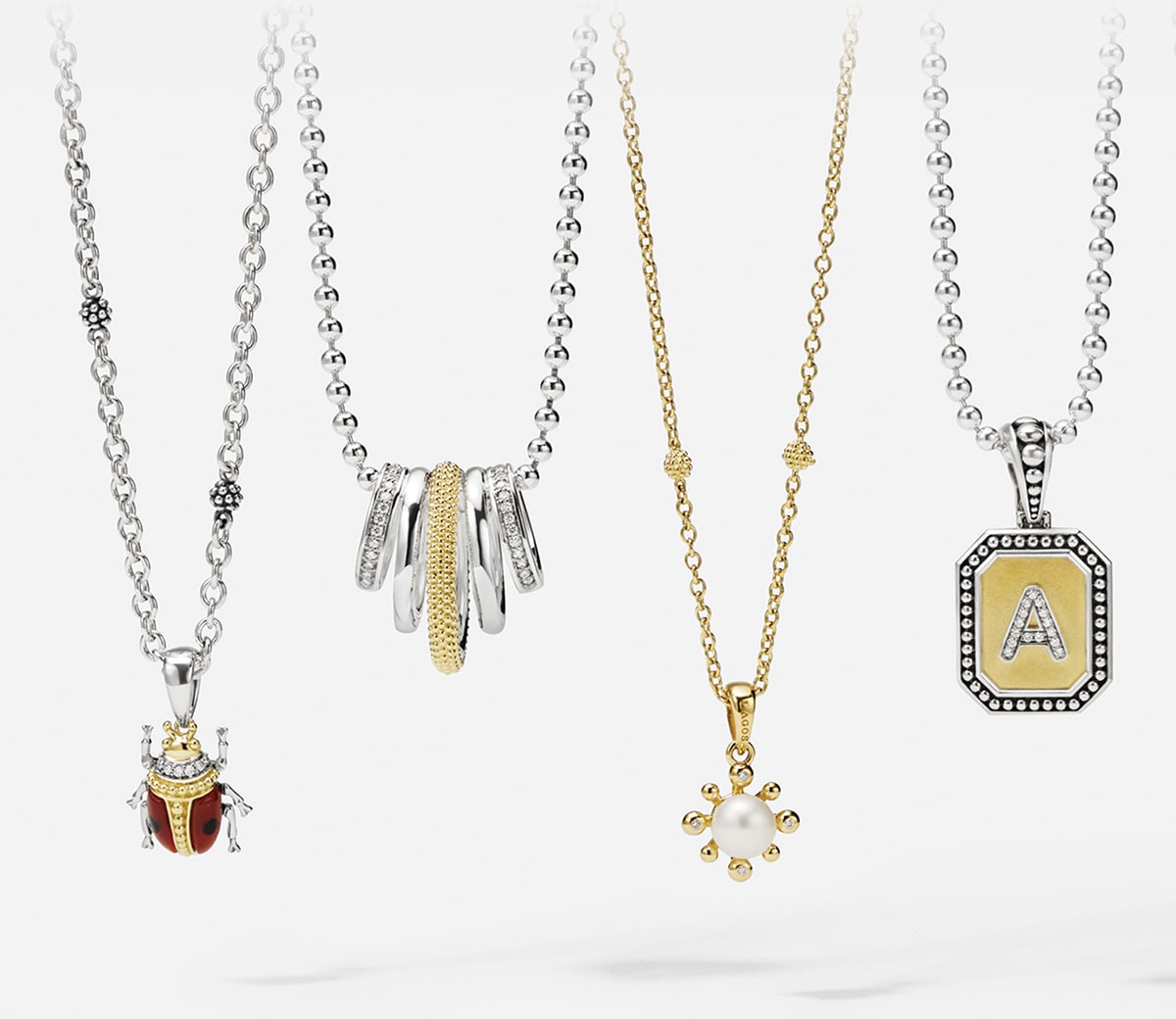 Diamond, pearl, and gold pendants