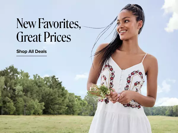 New favorites, great prices. Shop all deals. A woman in a white dress outside.