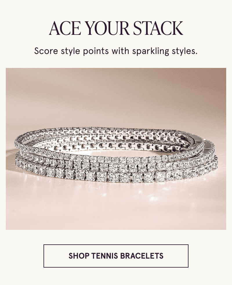A stack of three diamond tennis bracelets. Score style points. Click here to shop tennis bracelets