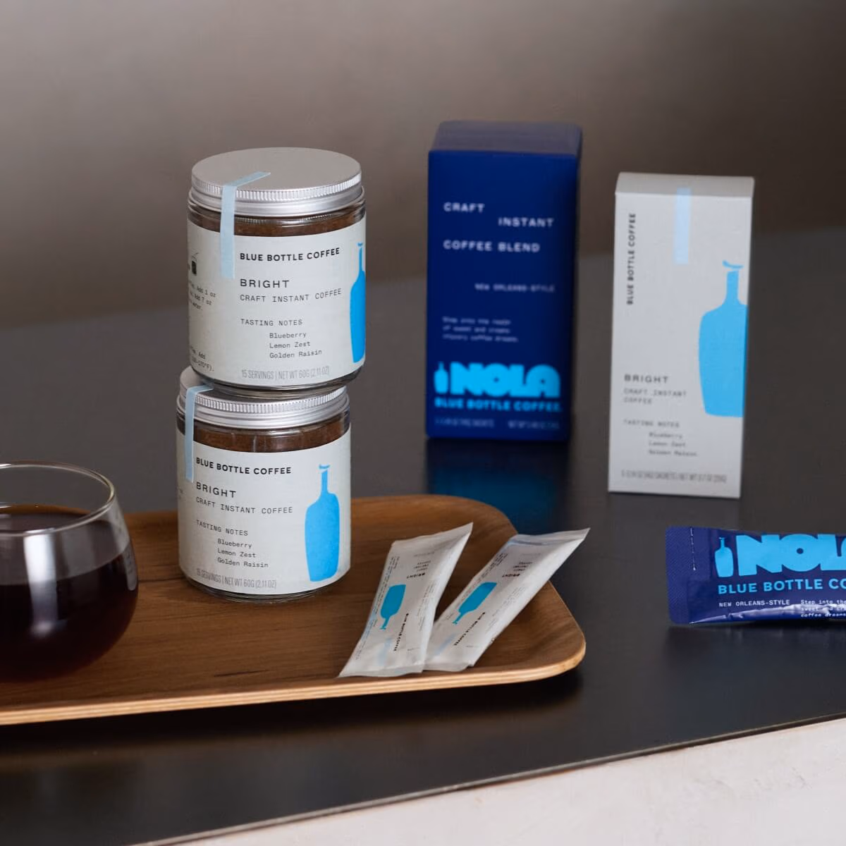 Image of coffee containers and coffee cup.