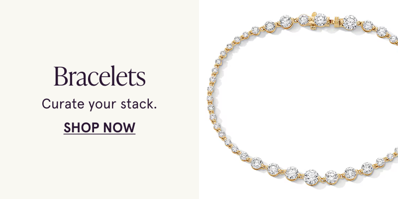 A gold bracelet with graduated diamonds. Curate your stack. Click here to shop bracelets