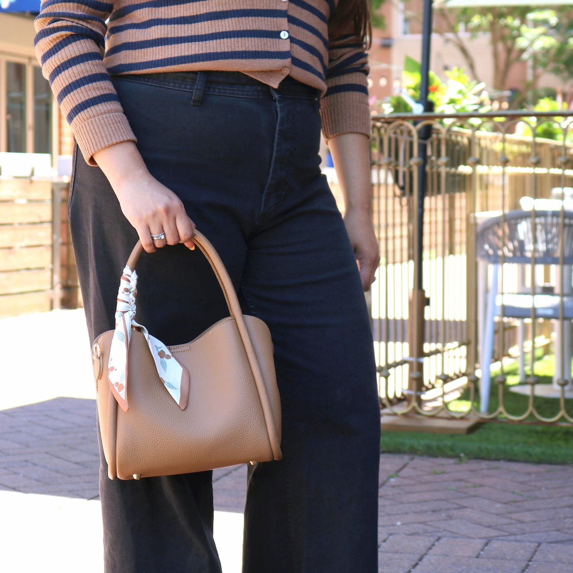 Women holding handbag