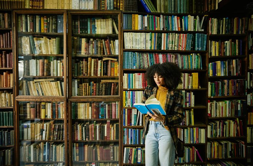 Woman reading in library