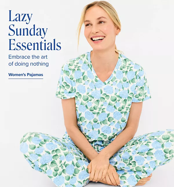 Lazy Sunday essentials. Embrace the art of doing nothing. Womens pajamas. A woman in floral patterned pajamas.