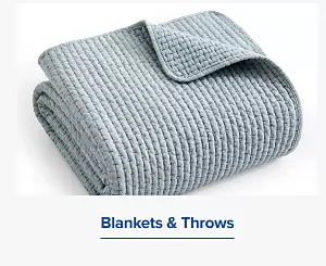 A woven blanket. Blankets and throws.