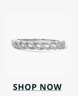 Delicate sterling silver band ring designed with a twisted, stone-lined braided pattern. Click here to shop now