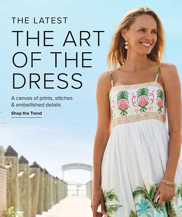 The latest. The art of the dress. A canvas of prints, stitches and embellished details. Shop the trend. A woman in a white dress with stitching up top.