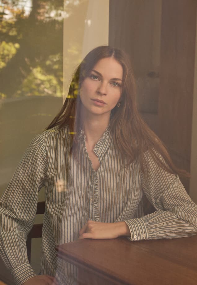 Image shows a model wearing the Betty Shirt in Multi.