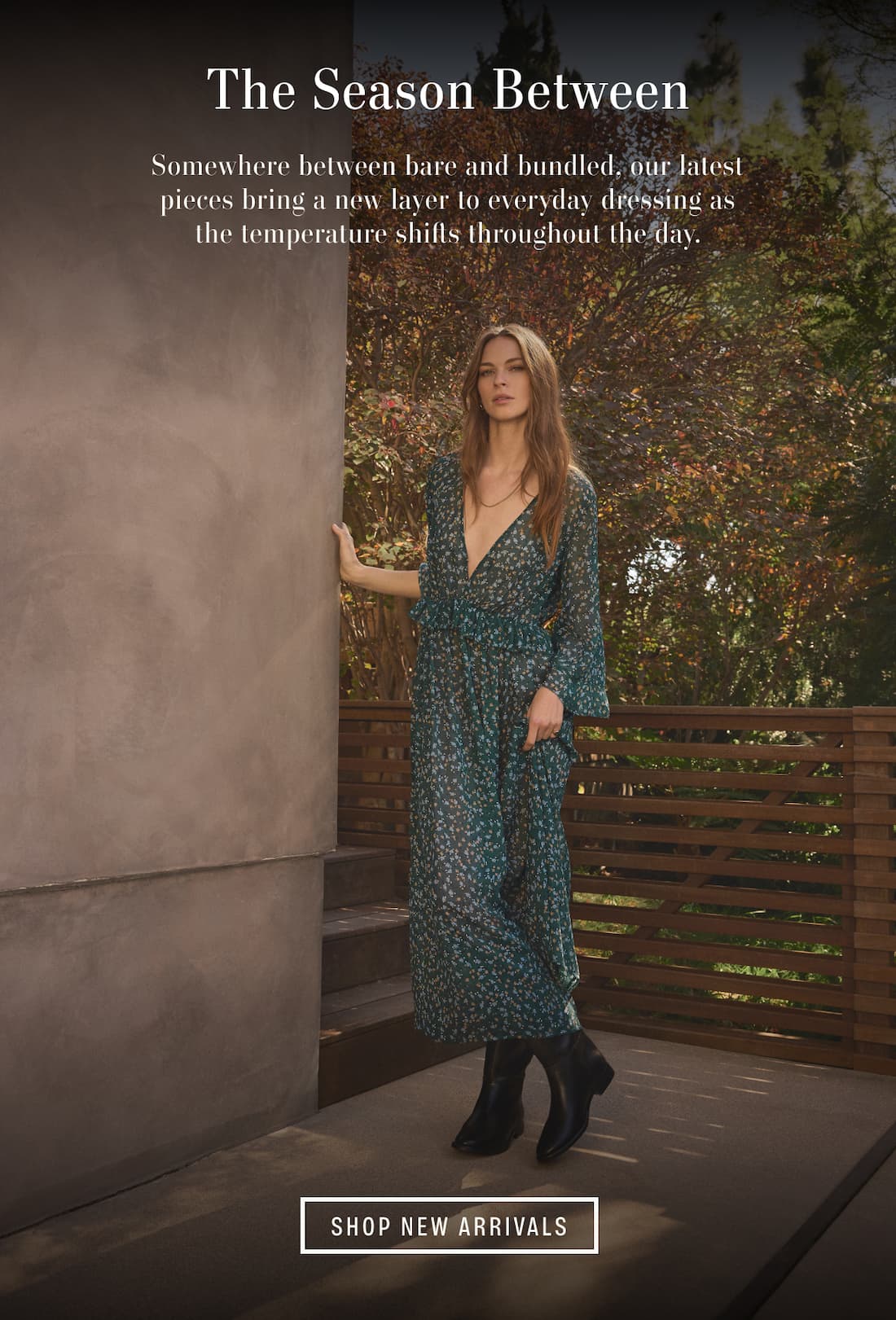 Image shows a model wearing the Isabela Dress in Bluegrass. Text reads: The Season Between. Somewhere between bare and bundled, our latest pieces bring a new layer to everyday dressing as the temperature shifts throughout the day.
