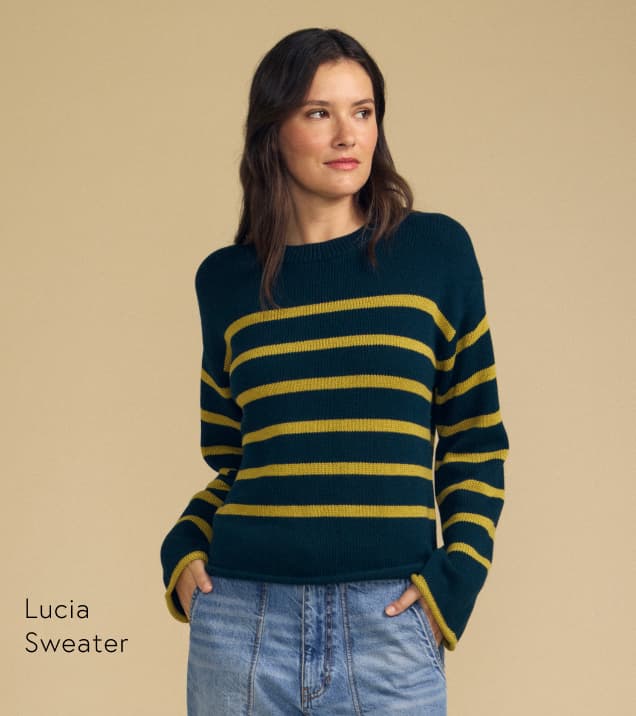 Image shows a model wearing the Frances Top in Bluegrass.