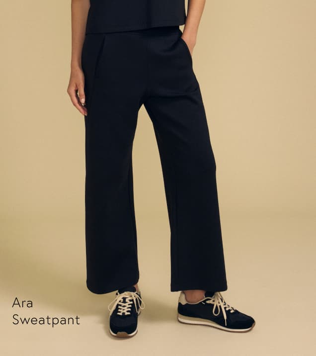 Image shows a model wearing the Ara Pants in Black.