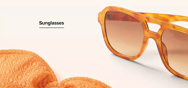 Sunglasses. A pair of tortoise sunglasses. 